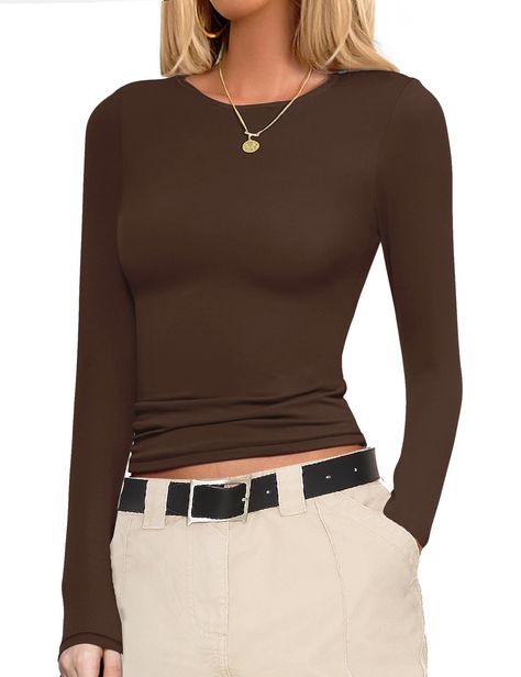 PRICES MAY VARY. Classic & Special Length Design - This long sleeve thermal tops features a boat neck design and a Shorter basic T-shirt length. Its adaptability shines as it effortlessly transitions from a tucked-in inner layer to a stylish crop top when stacked at the waist, making it a must-have piece for those seeking to channel the fall fashion trend. Ultimate Comfort Thermal Tops - The fabric is soft, skin-friendly and smooth to touch. Four-way stretching provides excellent elasticity and Fall Long Sleeve Shirts, Long Sleeve Shirt Outfits, Boat Neck Design, Fitted Tops, Stylish Crop Top, Layered Tops, Girls Wardrobe, Womens Long Sleeve Shirts, Fall Fashion Trends