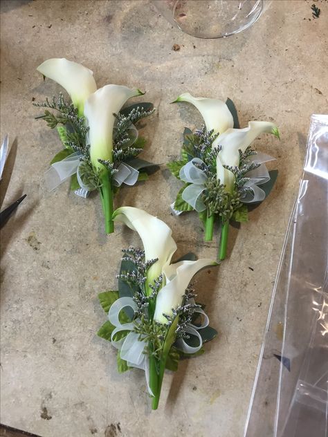 Calla Lily Corsages - seeded eucalyptus and limonium Calla Lily And Eucalyptus Bouquet, Lily And Eucalyptus Bouquet, Cala Lilly Boutineer, Corsage Calla Lily, Calla Lillies Centerpieces, Mini Calla Lily Boutonniere, Calla Lily Buttonhole, Calla Lily Bridal Bouquet, Calla Lily Boutonniere