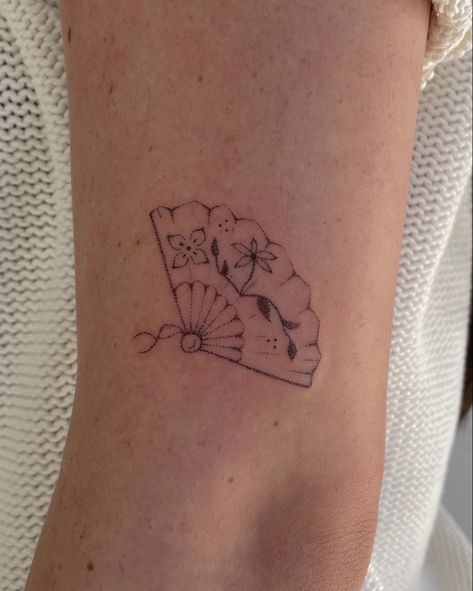 dainty fan tattoo @steffxink Tiny Fan Tattoo, Suki Waterhouse Tattoo, Vintage Fine Line Tattoo, Childhood Home Tattoo Ideas, Fine Line Fan Tattoo, Dainty Cherry Tattoo, Fine Line Landscape Tattoo, Small Fan Tattoo, Dainty Taylor Swift Tattoo