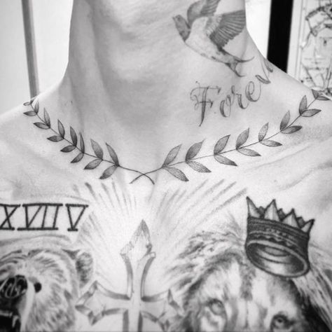 Justin Bieber has about 60 different tattoos on his body, and each of the tattoos stands for something Justin has encountered in his lifetime. Significant Tattoos, Laurel Tattoo, Justin Tattoo, Laurel Wreath Tattoo, Justin Bieber Tattoos, Famous Music Artists, Wreath Tattoo, Famous Music, Simple Tattoos For Guys