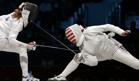 Courtney Hurley of the U.S. (R) competes against Russia's Anna Sivkova during their women's eppe team bronze medal fencing match at the ExCel venue at the London 2012 Olympic Games August 4, 2012. REUTERS/Damir Sagolj (BRITAIN - Tags: OLYMPICS SPORT FENCING) Olympic Fencing, Fencing Sport, Heptathlon, Target Area, Yandere Girl, Olympic Swimmers, Combat Training, Photo Slideshow, Fence Art