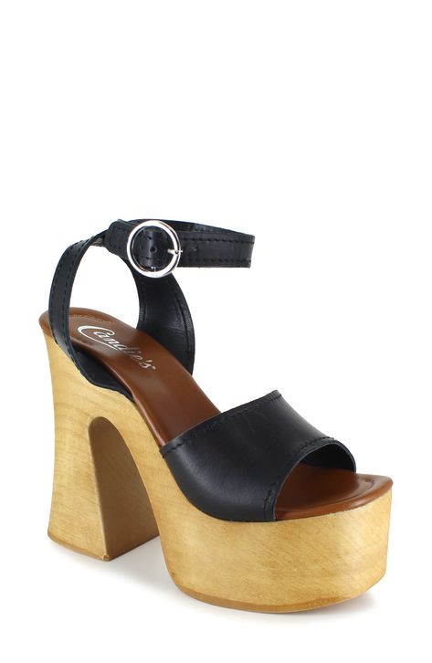 An ankle-strap sandal made from smooth leather offers bold retro vibes with a sculptural woodgrain platform and sky-high block heel. 4" heel; 1 1/2" platform Adjustable ankle strap with buckle closure Leather upper and lining/synthetic sole Imported Wooden Heels, Leather Platform Sandals, Wooden Heel, Fabulous Shoes, Hot Shoes, Sky High, Sandal Women, Ankle Strap Sandals, Strap Sandals