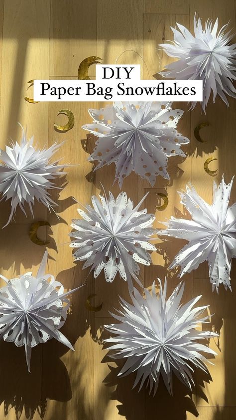 3d Paper Bag Snowflakes, Paper Bag Snowflake Designs, Lunch Bag Snowflake Patterns, Paper Bag Snowflake Template, White Paper Bag Snowflakes, Lunch Bag Snowflakes Brown Paper, Winter Paper Decorations, Paper Bag Snowflake Patterns, How To Make Snowflakes Out Of Paper