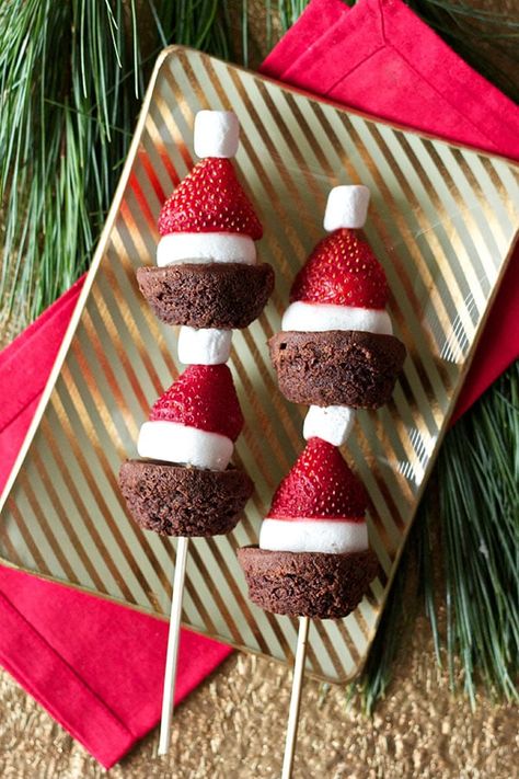 Strawberry Santa Hat Brownie Kabobs Brownie Santa Hats Strawberries, Brownie Santa Hats, Brownie Kabobs, Strawberry Santa Hats, Strawberry Santa, Strawberry Santas, Christmas Party Snacks, Kids Treats, Christmas Brownies