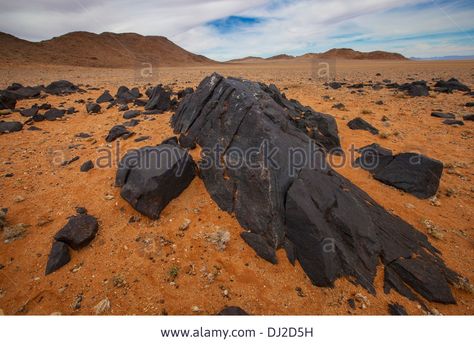 pitch-black-rocks-in-the-desert-klein-aus-vista-namibia-DJ2D5H Desert Temple, Desert Rocks, Black Rocks, Black Rock Desert, Pitch Black, Bonsai Pots, Black Rock, In The Desert, Mountain Landscape