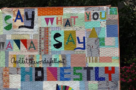 Improv word quilt. Stitched in Color.  Added some of the words by fabric gluing the letters and them couching Quilts With Text, Quilt Letters, Word Quilts, Edge To Edge Quilting, Improv Quilts, Quilt Backs, Pineapple Fabric, Improv Quilting, Picnic Quilt