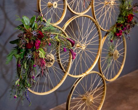 Downtown Phoenix Bicycle Themed Wedding. Bicycle Wheel Ceremony Backdrop Cycle Decoration Ideas, Bicycle Decorating Ideas, Bike Floral Arrangements, Bike Wheel Decor, Dollar General Home Decor, Bicycle Theme Party, Bike Themed Wedding, Bike Wheel Wedding Decor, Bicycle Floral Arrangement