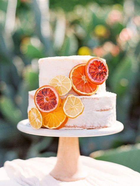 Oh happy day! This fruity Joshua Tree wedding inspiration is here to stay! Papaya, grapefruit, lemon, pomegranate… all the best citrus colors are present in this otherwise earthy desert scene. We are obsessed with the flirty bohemian fashion and the whimsical decor at play, so dive in with us because these photos are not to be missed! #ruffledblog #lemoncake Yellow Orange Wedding Theme, Groom Cakes, Citrus Baby, Bridal Shower Inspo, Citrus Wedding, Joshua Tree Wedding, Orange Party, Fiesta Tropical, Lifestyle Portraits