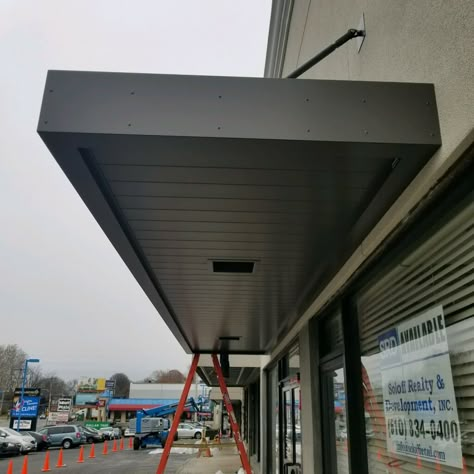 MASA Extrudeck canopy with lights at Grant Plaza in Philadelphia, PA. #architecture #design #metal #manufacturing #Americanmade House Canopy Exterior, Entrance Canopy Design, Canopy With Lights, Metal Door Canopy, Building Canopy, Metal Awnings, House Canopy, Canopy Ideas, Canopy Glass