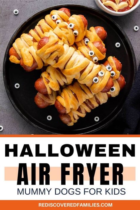 Looking for a quick and fun Halloween recipe? Try making Air Fryer Mummy Dogs. These adorable snacks are easy to prepare and perfect for kids. Get the full recipe and step-by-step instructions at rediscoveredfamilies.com Halloween Mummy Dogs, Hot Dog Crescent Rolls, Fun Halloween Snacks, Mummy Hot Dogs, Mummy Dogs, Halloween Snacks For Kids, Halloween Lunch, Halloween Themed Food, Halloween Snack