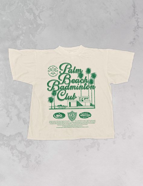 Join the Palm Beach Badminton Club in this vintage style oversized sweatshirt! - Features Palm Beach Badminton Club with 93 in a crest underneath and a description of the sport below it all in a green ink - Screen print transfer that is heat pressed onto each tshirt - Tshirt is a super soft vintage wash that gets softer after each wash - Oversized fit - Sizing translation: XS/S = L , S/M = XL , L/XL = 2XL , 2XL/3XL = 3XL - 100% Cotton - Model is 5'9 wearing a size 2XL/3XL **due to screens & filters color may vary from pictures** Beach Design Graphic, Retro Shirts Vintage Graphic Tees, Club Tshirt Designs, Beach Badminton, Vintage T-shirt, Club Shirt Designs, Style Oversized Sweatshirt, Sports Shirt Design, Graphic Design Vintage