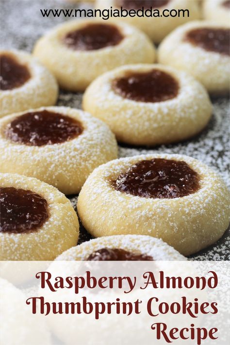 Easy jam filled thumbprint cookies with almond flour! #thumbprintcookies #shortbreadjamcookies Almond Flour Jam Thumbprint Cookies, Almond Shortbread Thumbprint Cookies, Christmas Cookies With Almond Flour, Almond Flour Thumbprint Cookies Recipe, Italian Thumbprint Cookies, Almond Flour Christmas Cookies Recipes, Almond Flour Christmas Cookies, Almond Flour Cookies Recipes, Almond Flour Cookie Recipes