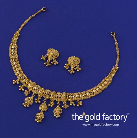 A midi-necklace that showcases katai, ball and wire-work in equal measure and does justice to each by balancing them beautifully to create a design of rare import in an ornament so light in weight. With matched eartops, all in hallmarked 22K gold. Necklace: 12 gm, price Rs. 35,200/- Earring: 3 gm price Rs. 8800/- Gold Necklace Light Weight Designs, Gold Necklace Set Simple With Price, Light Weight Gold Necklace Indian, 30 Gms Gold Necklace Set, Necklace Set Gold Wedding Jewelry, 20gms Gold Necklace Designs, Gold Necklace Set Design, Light Gold Necklace, Gold Necklace Set Simple