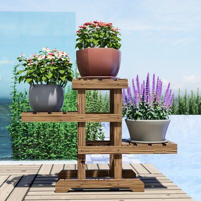 It is made of solid fir wood. It is a simple and practical design. You can display a wooden flower pot shelf, potted plants, pottery or other decorative items. This plant stand makes it possible to decorate with plants everywhere at your home. Perfect for your patio, or in the backyard, or garden to enhance the house decor. | Bay Isle Home™ Eisele Zigzag Pallet Plant Stand Wood in Brown | 19.69 H x 27.95 W x 9.45 D in | Wayfair Pallet Plant Stand, Plants Everywhere, Decorate With Plants, Pot Shelf, Lawn Care Business Cards, Outdoor Shelves, Garden Plant Stand, Support Pour Plante, Wood Pots