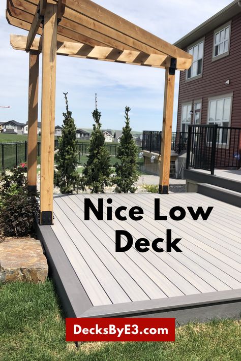 Low Composite Deck Ideas, Low Platform Deck, Low Patio Deck Ground Level, Ground Level Deck With Pergola, Platform Deck With Pergola, Composite Deck With Pergola, Low Decks Backyard Ground Level, Deck With No Railing, Deck To Patio Transition Ideas