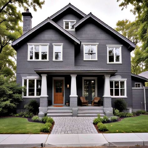 40 Modern Grey House Exterior Color Schemes and Ideas Gray House Exterior White Trim, Color Schemes For Exterior Of House, Dark Grey Stucco House Exterior, Dark Grey Exterior House Colors, Modern Grey House Exterior, Grey Painted Brick House, Grey Stucco House Exterior, Dark Grey House Exterior, Dark Gray House Exterior