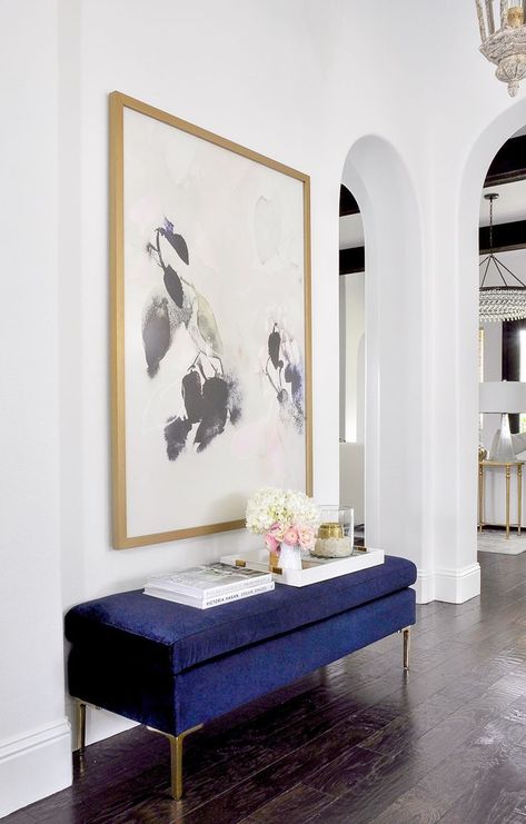 decorated home entry with blue velvet bench and beautiful large artwork Film Decor, Velvet Bench, Large Scale Art, Scale Art, Foyer Decorating, Bench Decor, Large Artwork, Boutique Interior, Entryway Ideas