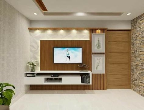 Tv wall unit with lighting Modern Tv Wall Units For Hall Simple, Tv Unit Decor Modern Tv Cabinets For Hall, Hall Tv Unit Design Modern Simple, Simple Tv Unit Design, Tv Room Decor, Lcd Panel Design, Modern Tv Room, Modern Tv Unit Designs, Tv Unit Design Modern