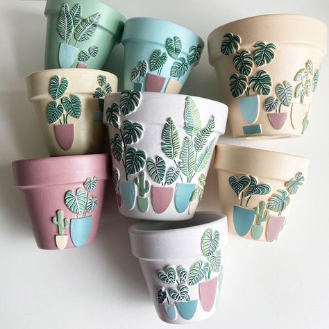 My latest collection of hand painfed plant pots! More coming soon.... Clay Plant Accessories, Paper Toilet Roll Crafts, Polymer Clay Plant Pot, Beautiful Painting Ideas, Wallpaper Plants Aesthetic, Painting Planters, Toilet Roll Crafts, Pots Painting, Aesthetic Crafts