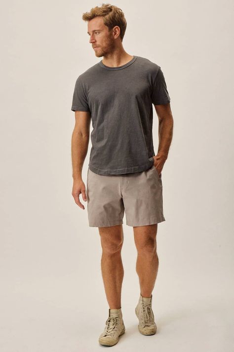 Men's light grey shorts, charcoal T-shirt and light grey high-top sneakers. This outfit was included in the article: What Colours To Wear With Grey Shorts: 6 Foolproof Shirt Options, on MensFlair.com Dark Grey Chinos, Grey Chinos, White Linen Shirt, Tailored Shorts, Pique Polo Shirt, Grey Pants, Green Shirt, Grey Shorts, Drawstring Shorts