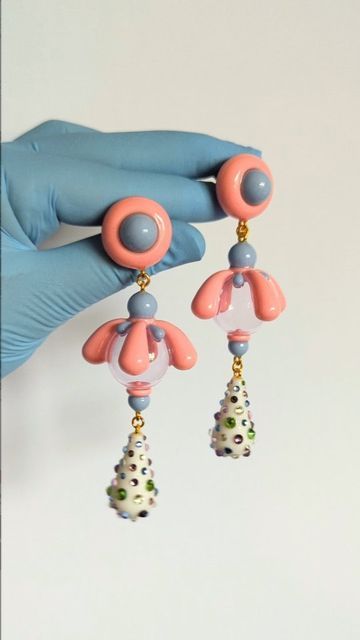 G1000 on Instagram: "Custom pink/blue/white polymer clay with UV resin, rhinestones and glass globes in the chandelier style that we're absolutely obsessed with" Clay Idea, White Polymer Clay, Glass Globes, Chandelier Style, Brooch Vintage, Uv Resin, Glass Globe, Pink Blue, Choker