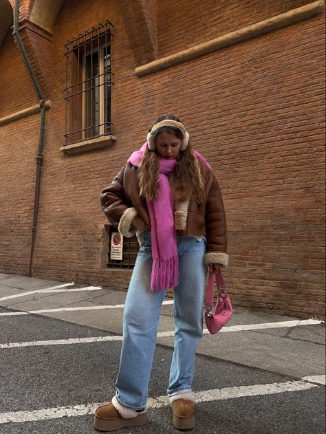 Brown jacket, winter jacket, winter outfit, winter accessories, winter scarf, pink scarf, pink bag, uggs, ugg outfit, winter outfit, cold season outfit, vintage jacket, earmuffs,ootd Trendy Jackets 2023, Pink And Brown Winter Outfit, Pastel Scarf Outfit, Brown Jacket Winter Outfit, Brown Winter Jacket Outfit, Pink Earmuffs Outfit, Pink Bag Outfit Winter, Winter Outfit Colorful, Ugg Earmuffs Outfit