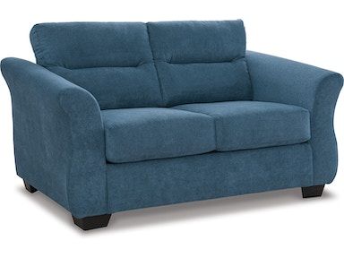 Marvel at the beauty of a subtle showstopper. This loveseat appeals to those with a uniquely chic eye for comfort pieces. Its personality is one of playful simplicity, with curving, tapered arms incorporating movement into the structured silhouette.