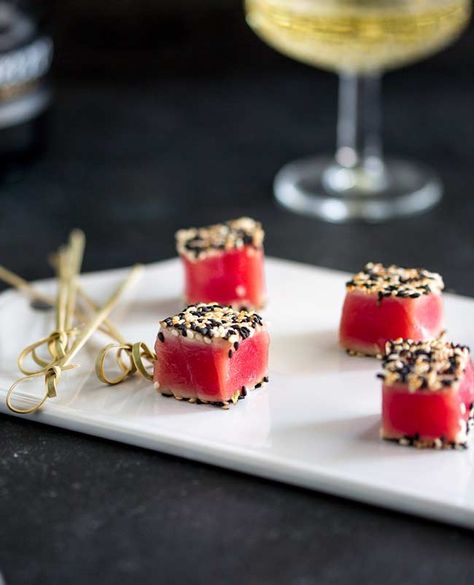 Seared Sesame Tuna Bites - A Quick Canapé | Sprinkles and Sprouts Tuna Seared, Sesame Tuna, Tuna Bites, Festive Holiday Cocktails, Nibbles For Party, Canapes Recipes, Seared Tuna, White Platter, Holiday Cocktail Party