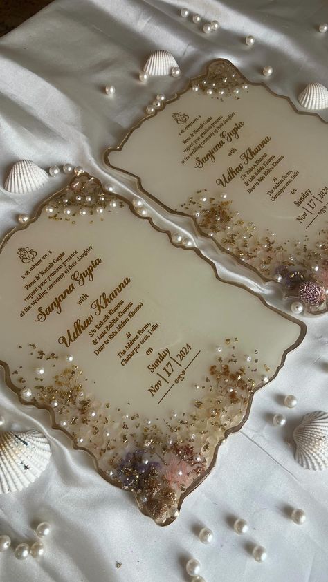 The Gifting Avenue | ✨ Elevate your special day with our mesmerizing resin wedding invites! ✨ Each piece is a unique masterpiece, capturing the essence of your... | Instagram Resin Wedding Card, Resin Invitation, Resin Wedding Invitation, Wedding Invitation Cards Handmade, Resin Wedding, Save Videos, Coconut Shell Crafts, Elegant Wedding Invitation Card, Unique Wedding Cards