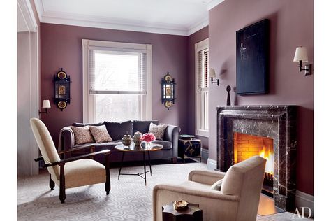 At a Boston residence devised by Thad Hayes, the master sitting area includes a 1950s cocktail table attributed to Jules Leleu from Maison Gerard. Jewel Tone Paint Colors, Jewel Tone Living Room, Feminine Interior Design, Mauve Walls, Boston House, Paint Color Inspiration, Interior House Colors, Purple Rooms, A Living Room