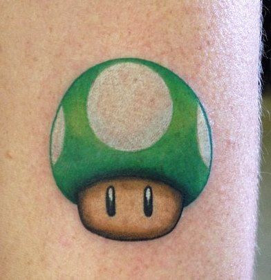 Mario Mushroom: Custom tattoo by Jason Dasaro at Arrows and Embers in Concord, NH #Jason #NH #newengland #mario #mushroom #color #tattoo #inkedup #best #love #picoftheday #proartist #ink #art #bodymodification Super Mario Tattoo, Black Flowers Tattoo, Mario Tattoo, Mushroom Color, Prison Tattoos, Concord Nh, Mushroom Tattoos, Gaming Tattoo, Traditional Tattoo Art