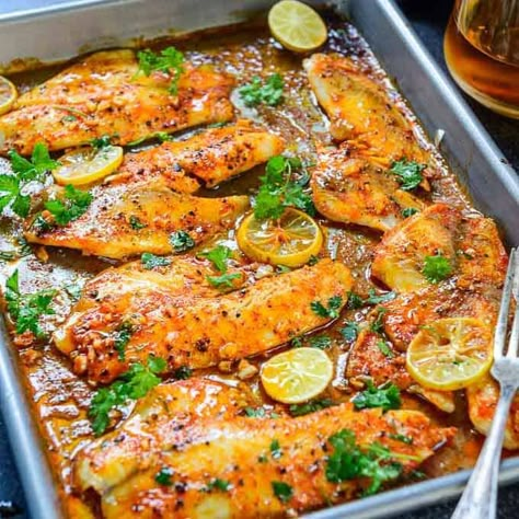 This Spicy Lemon Garlic Baked Tilapia takes all of 5 minute of preparation time before you pop it in the oven. Karahi Paneer, Tilapia Recipes Healthy, Oven Baked Tilapia, Tilapia Recipes Easy, Paneer Gravy, Baked Tilapia Recipes, Lachha Paratha, Kadai Paneer, Garlic Baked