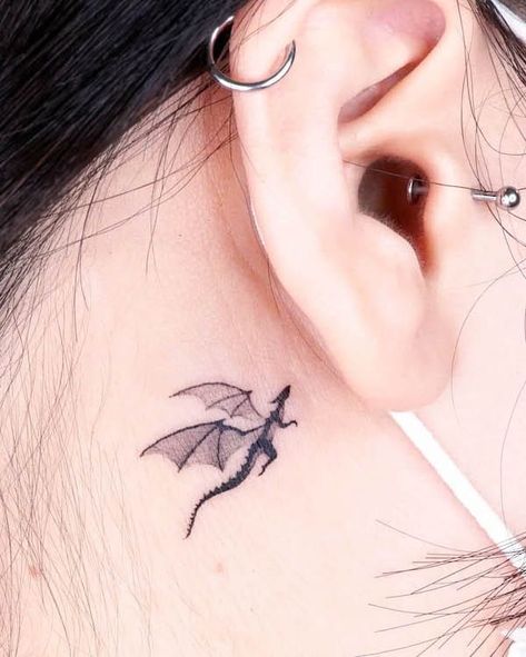 Tiny dragon behind the ear by @choiyun_tattoo Dragon Tattoo Ear, Dragon Tattoo Behind Ear, Dragon Tattoo Wrist, Ear Tattoos For Men, Inner Ear Tattoo, Rip Tattoos For Mom, Worst Tattoos, Behind Ear Tattoos, Tattoos For Men And Women