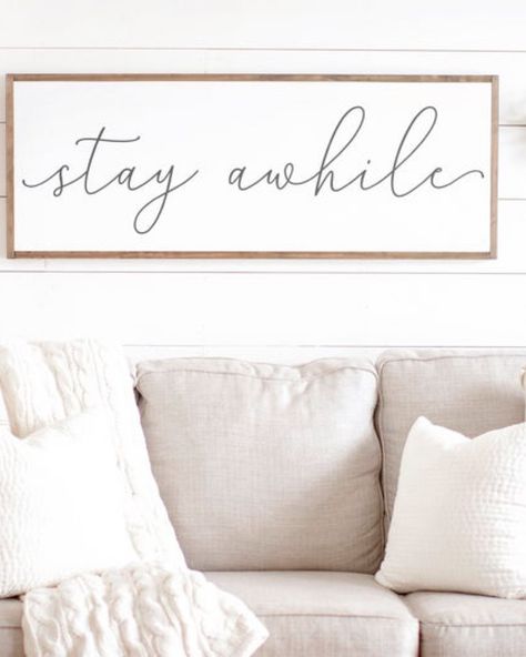 Stay Awhile Sign Living Rooms, Living Room Sign Ideas, Stay A While Sign, Living Room Wall Signs, Living Room Signs, Wall Decor Above Couch, Lantern Wall Decor, Stay Awhile Sign, Living Room Quotes