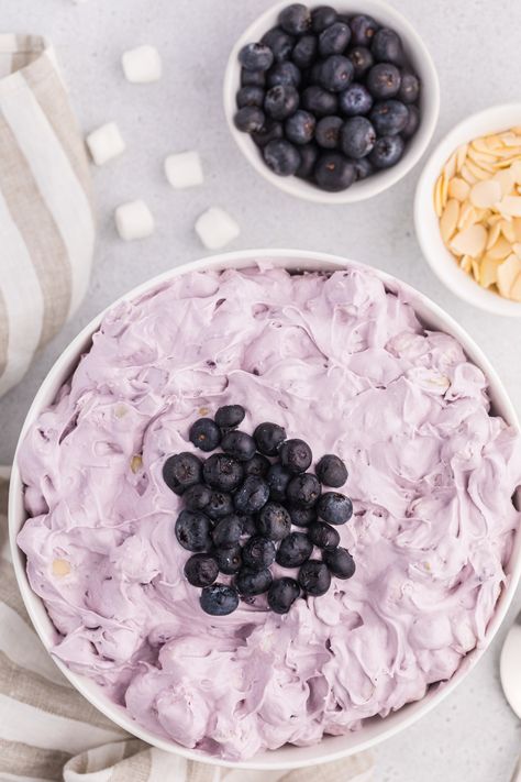 Light and fluffy Blueberry Fluff Salad is a classic dessert salad that’s perfect for your next cookout or for any occasion! Loaded with blueberries, mini marshmallows and studded with sweet pineapple chunks, this easy no bake dessert only takes 5 minutes to whip up. Blueberry Fluff Salad, Blueberry Fluff, Berry Salad Recipe, Dessert Salad Recipes, Grape Salad Recipe, Snickers Salad, Easy Fruit Salad Recipes, Fluff Salad, Blueberry Salad