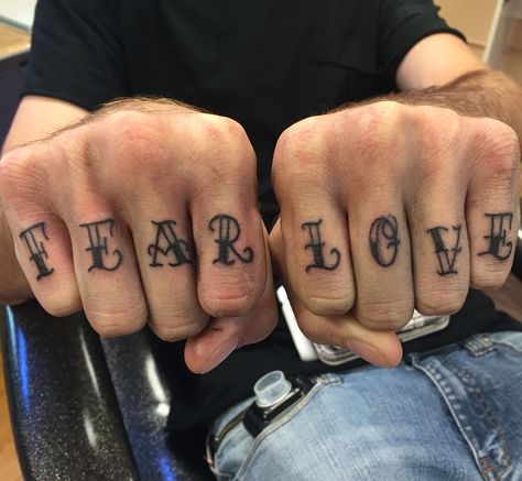 Knuckle tattoo set by Violet Page Knuckle Font Tattoo, Love On Finger Tattoo, Word Tattoos On Fingers, Men Knuckle Tattoos, Fear Love Tattoo, Finger Knuckle Tattoo, Finger Tattoos Men Words, Knuckle Tattoo Lettering, Knuckle Lettering Tattoos