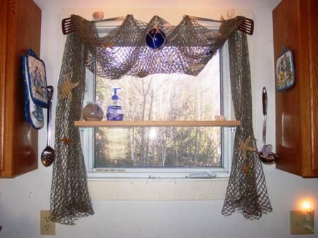 Decorating nautical with a Window Frame | ... , fish, etc. You can make your own pulls with a simple nautical knot Fishnet Ceiling Decor, Fishnet Decorating Ideas, Nautical Window Display, Fishnet Curtains, Nautical Window Treatments, Fish Net Decor, Nautical Curtains, Bathroom Window Treatments, Bathrooms Ideas