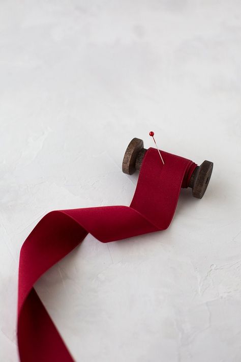 "Burgundy red matte double faced satin ribbon A muted, subtle alternative to classic satin 100% cotton Wood spool is sold separately. If your desired width/length is out of stock, please inquire.  Chose from three widths: * ⅝\" wide * 1\" wide * 1½\" wide Full spool yardage: (if out of stock, contact for availability) * Half Spool - 50 yards * Full Spool - 100 yards Hand-wound on a wooden paddle with a pin. Single yards will arrive loose. If ordering multiple quantities, the ribbon may arrive as Red Velvet Ribbon, Wooden Paddle, Wood Spool, Battle Ground, Deep Red Color, Red Candy, Burgundy Wine, Purple Velvet, Velvet Ribbon