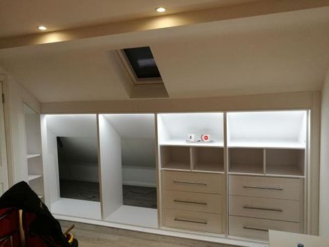 Fitted Wardrobes Loft Bedroom, Dressing Room Eaves, Built In Wardrobe Loft, Loft Fitted Wardrobe Ideas, Walk In Wardrobe Loft Conversion, Closet Under Roof, Loft Walk In Wardrobe, Loft Built Ins, Loft Conversion Eaves Storage