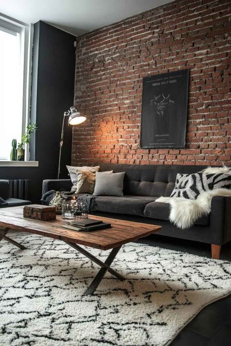 A contemporary space featuring exposed brick paired with industrial steel. Loft Apartment Inspiration, Industrial Sitting Room, Minimalist Industrial Interior Design, Modern Industrial Interior Design, Loft Decorating Ideas Upstairs, Industrial Living Room Ideas, Beautiful Houses Exterior, Creative Bathroom Design, Modern Industrial Living Room