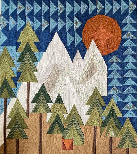 Again…still...the mountains are calling….cooeee! This is the 3rd time this great quilt pattern has come across my longarm rails. It’s such a unique design, and quilting all the textures just brings it to life. Also, the little fox has finishing touches still coming, including a fluffy, foxy tail. The pattern is actually called “The Mountains are Calling”, by Janet Nesbitt of @ones1ster. AND, if you want it quilted in a similar fashion, I’m getting pretty speedy at it😁 Mountain Quilt Pattern, Mountain Quilt, Personalized Baby Quilt, Tree Quilts, Mountain Quilts, Quilt Modernen, Quilted Wall Hanging, Appliqué Quilts, Christmas Quilting