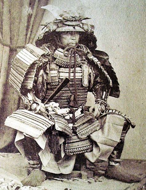 Samurai wearing armor and holding a tessen fan. Warrior Background, Tessen Fan, Samurai Photography, Guerriero Samurai, Ronin Samurai, Samurai Warriors, Samurai Artwork, Japan History, Japanese Warrior