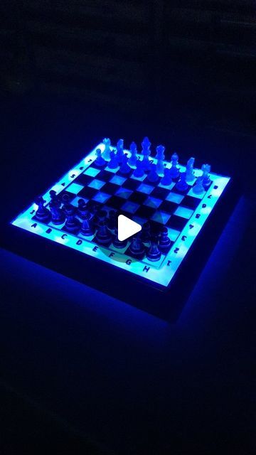 FxP art on Instagram: "Handcrafted Chess Set Made from Zebrano Wood and Epoxy Resin  Check out this unique chess set I handcrafted from zebrano wood and epoxy resin! 🌟 Each piece is hand-cast from resin, and the board is illuminated with battery-powered LEDs controlled by a remote, allowing you to place it anywhere! 🏆♟️✨  If you like this project, let me know in the comments and follow me to see more of such unique creations! 🔥👀   The perfect epoxy for any project👇  https://www.resinplan.com/  After choosing the right set, the code with a 10% discount ➡️ FXP ⬅️  #HandcraftedChess #ZebranoWood #EpoxyResin #LEDChessSet #DIYChess #Craftsmanship #UniqueChessSet #fxpart" Resin Chess Board Ideas, Epoxy Chess Board, Epoxy Resin Chessboard, Chess Set Resin, Wood And Epoxy Chess Board, Resin Chess Set, Chess Set Unique, Chess Set, Hand Cast