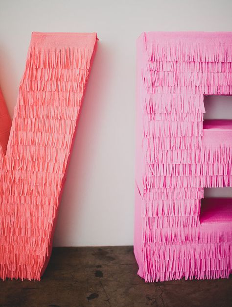 crepe paper fringe letters | photos by @Katie Hrubec Hrubec Hrubec Hrubec Hrubec Hrubec Pritchard Fringe Letters, Paper Fringe, Pinata Diy, Best Wedding Planner Book, Showroom Inspiration, Giant Letters, Cardboard Letters, Diy Pinata, Wedding Planner Book