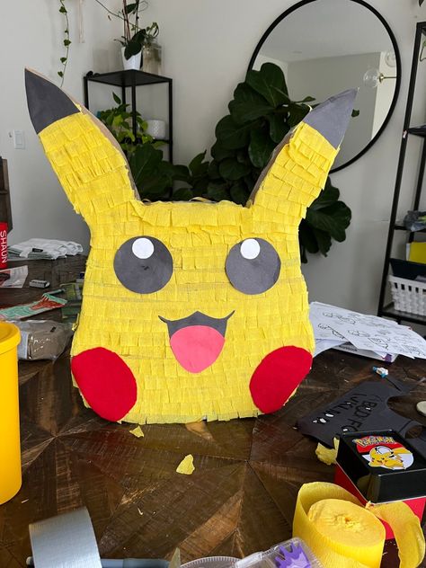 <p>For my 8-year-old son’s birthday this year, I pulled off a super fun Pokemon party, which featured tons of Pokemon games, a balloon arch, Pokeball party favours, and a cool homemade Pikachu pinata! I have to tell you; that pinata was a hit! It was such a simple and budget-friendly project, too. To make your own …</p> <p class="read-more"> <a class="" href="https://hanashappyhome.com/seasonal/birthdays/diy-pokemon-pinata/"> <span class="screen-reader-text">How to make you own Pokemon ... Pikachu Pinata, Pokemon Pinata, Diy Pikachu, Pokemon Party Games, Make Your Own Pokemon, Pokemon Birthday Party Ideas, Pokemon Balloons, Pokemon Party Decorations, Pokemon Decor