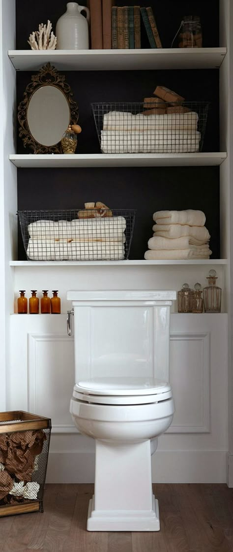 Adding built-in or freestanding shelving behind the toilet is a great way to add some extra storage in a small bathroom! Organizing With Baskets, Makeover Kamar Mandi, Bilik Air, Decor Ikea, Toilet Storage, Distressed Furniture, Bad Design, Tiny Bathroom, Bathroom Redo