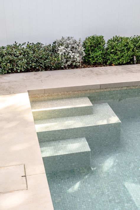 Would you believe us if we told you that this pool was excavated entirely by hand?   Swipe to see more details of this awesome pool. Pool Steps Design, Pool Stepping Stones, Modern Mediterranean Garden, Bali Pool, Pool Patio Designs, Pool Plants, White Pool, Outdoor Pool Area, Stone Pool