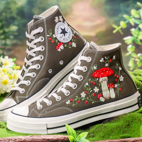 Custom Converse Chuck Taylor Mushrooms Embroidered Converse Shoes, Mushrooms Embroidered Shoes Custom, Embroidered Mushrooms Sneakers 💚 Immerse yourself in the intricate craftsmanship as we lovingly hand embroider rustic flowers onto your chosen Converse pair 💚 🌿 The listed price encompasses both the Converse Shoes and the showcased Embroidery Designs. 1. MANUFACTURING PROCEDURE 🌿 Upon receiving your order, we initiate the shoe preparation process. If your chosen shoes are readily available Hand Embroidery On Shoes, Converse Mushroom, Mushroom Converse, Mushroom Shoes, Cottage Core Converse, Embroider Converse High Tops, Embroidery Converse, Mushroom Embroidered Converse, Converse High Tops Embroidered