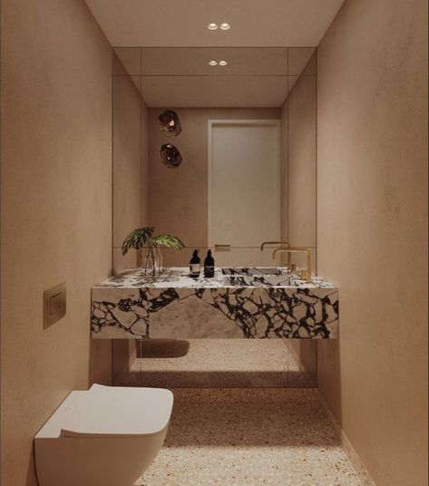 Sici Design on Instagram: "Introducing project Stanmore. Tying in soft terracotta tones with terrazzo and micro cement. Paired with the elegance of Calacatta Viola." Micro Bathroom Design, Calacatta Bathroom Ideas, Calacatta Viola Bathroom, Powder Room Neutral, Rose Quartz Bathroom, Micro Cement Floor, Bathroom Terracotta Floor, Integrated Stone Sink, Micro Cement Bathroom