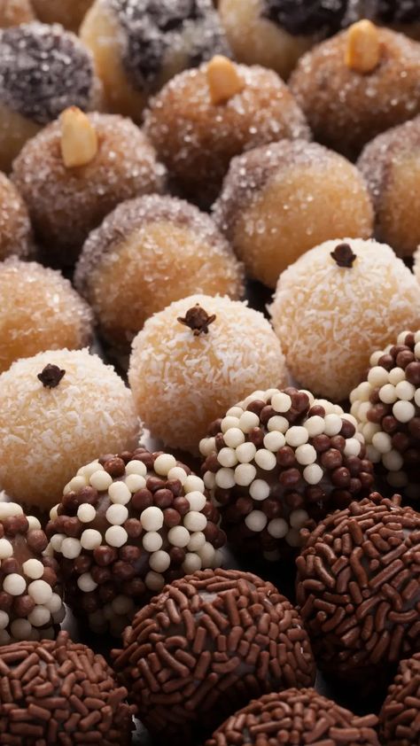 How To Make Beijinho: Brazilian Coconut And Condensed Milk Balls Condensed Milk And Coconut Balls, Brazilian Coconut Balls, Coconut Candy Recipe Condensed Milk, Condensed Milk Balls, Coconut Ball, Brigadeiro Recipe, Milk Balls, Brazilian Desserts, Coconut Balls